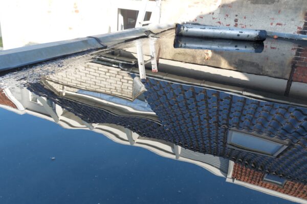 staand water op plat dak